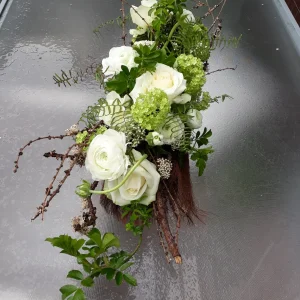 Grafstukje met takken